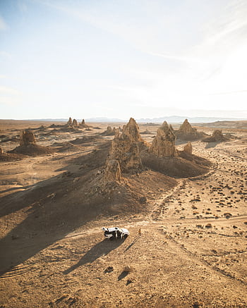 Aerial graphy showcasing the striking Trona Pinnacles geological formations in a desert landscape. HD phone wallpaper