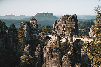 Bridge through rock cliffs, architecture, nature, mountains HD wallpaper