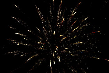 A stunning display of colorful fireworks illuminating the night sky. HD wallpaper