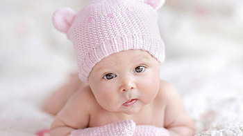 Cute Baby Boy Is Lying Down On White Cloth Wearing Light Pink Woolen Knitted Cap Cute HD wallpaper
