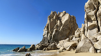 Ocean Coast Rocks Beach Sand Under Blue Sky Nature HD wallpaper